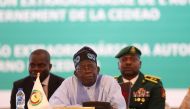 Chairperson of Economic Community of West African States (ECOWAS) and President of Nigeria, Bola Ahmed Tinubu, reacts while addressing the ECOWAS head of states and government, following Niger's military junta, in Abuja Nigeria on July 30, 2023 (Photo by Kola SULAIMON / AFP)