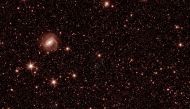 This handout photo provided courtesy of ESA/Euclid/Euclid Consortium/NASA on July 31, 2023, shows a test photo taken during commissioning of ESA / Euclid spacecraft, to check that the Near Infrared Spectrometer and Photometer (NISP) instrument is working as expected. (Photo by ESA/Euclid/Euclid Consortium/NASA / AFP) 