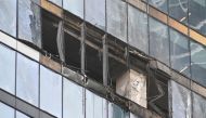 A view of a damaged office block of the Moscow International Business Center (Moskva City) following a reported drone attack in Moscow on August 1, 2023. (Photo by Alexander NEMENOV / AFP)

