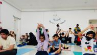 Participants during a yoga session at the summer camp.