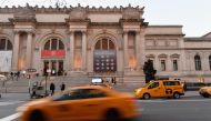 A yellow cab drives by the Metropolitan Museum of Art on January 7, 2021 in New York City. Photo by Angela Weiss / AFP