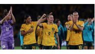 Australia's forward #09 Caitlin Foord (C) celebrates with teammates at the end of the Australia and New Zealand 2023 Women's World Cup round of 16 football match between Australia and Denmark at Stadium Australia in Sydney on August 7, 2023. (Photo by STEVE CHRISTO / AFP)