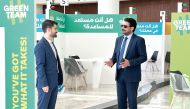 Pakistan Ambassador to Qatar H E Muhemmed Aejaz (left) with an official during the visit.