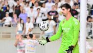 Thibaut Courtois #1 of Real Madrid reacts after giving up a goal to Dušan Vlahović (not pictured) of Juventus in stoppage time during the pre-season friendly match at Camping World Stadium on August 02, 2023 in Orlando, Florida. Julio Aguilar/Getty Images/AFP
