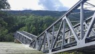 A photo taken on August 14, 2023 shows the railway bridge over the Gudbrandsdalslagen river in Ringebu, Norway after the bridge collapsed. Photo by Lars SKJEGGESTAD KLEVEN / NTB / AFP