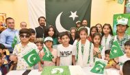Children with the Ambassador during the cake-cutting ceremony at the embassy. Pics: Abdul Basit
