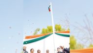 Ambassador of India to Qatar H E Vipul (centre) with other officials during the flag hoisting at the ICC yesterday.
