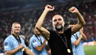 Manchester City's Spanish manager Pep Guardiola celebrates after winning the 2023 UEFA Super Cup football match between Manchester City and Sevilla at the Georgios Karaiskakis Stadium in Piraeus on August 16, 2023. Photo by Spyros BAKALIS / AFP