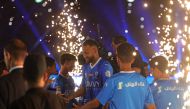 Brazilian superstar Neymar enters the pitch during his unveiling ceremony at Al-Hilal in Riyadh on August 19, 2023 as he becomes the latest world-famous footballer snapped up by the big-spending Saudi Pro League. (Photo by Fayez Nureldine / AFP)
