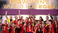 Spain's players celebrate with the trophy after winning the Australia and New Zealand 2023 Women's World Cup final football match between Spain and England at Stadium Australia in Sydney on August 20, 2023. Photo by FRANCK FIFE / AFP