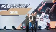 Qatar Basketball Federation (QBF) President Mohammed Saad Al Mughaiseeb (right) receives the award during the FIBA Awards ceremony held on the lines of the international federation's General Assembly in Manila, Philippines, yesterday.