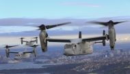 This image obtained from the US Marine Corps shows three MV-22B Osprey tiltrotor aircrafts flying in formation above the Pacific Ocean off the coast of Sydney on June 29, 2017. Photo by Amy PHAN / US MARINE CORPS / AFP
