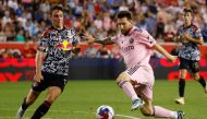 Lionel Messi #10 of Inter Miami CF battles against Peter Stroud #5 of New York Red Bulls in the second half during a match between Inter Miami CF and New York Red Bulls at Red Bull Arena on August 26, 2023 in Harrison, New Jersey.
