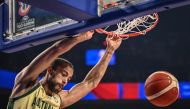 Australia's Xavier Cooks dunks the ball during the FIBA Basketball World Cup group F match between Australia and Japan at Okinawa Arena in Okinawa on August 29, 2023. (Photo by Yuichi Yamazaki / AFP)