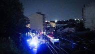Rescue vehicles are seen along the railway outside the train station of Brandizzo where five railway workers died after being hit by a train during overnight maintenance on August 31, 2023. Photo by Tino ROMANO / AFP