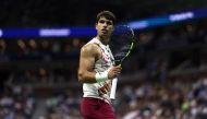 Carlos Alcaraz of Spain reacts against Lloyd Harris of South Africa during their Men's Singles Second Round match on Day Four of the 2023 US Open at the USTA Billie Jean King National Tennis Center at USTA Billie Jean King National Tennis Center on August 31, 2023 in the Flushing neighborhood of the Queens borough of New York City. Matthew Stockman/Getty Images/AFP