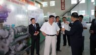 This undated picture released from North Korea's official Korean Central News Agency (KCNA) on September 3, 2023 shows North Korean leader Kim Jong Un inspecting the Pukjung Machine Complex in North Pyongan Province. (Photo by KCNA VIA KNS / AFP) /