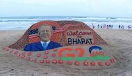 In this picture taken on September 6, 2023, a sand sculpture created by Indian sand artist Sudarsan Pattnaik representing US President Joe Biden's visit to India for the two-day G20 summit is pictured at Puri beach in India's Odisha state. (Photo by AFP)