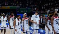 Team USA reacts after their loss during the FIBA Basketball World Cup semi-final match between USA and Germany in Manila on September 8, 2023. (Photo by JAM STA ROSA / AFP)