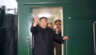 This picture taken on September 10, 2023, and released from North Korea's official Korean Central News Agency (KCNA) on September 12, 2023 shows North Korea's leader Kim Jong Un (C) waving as he departs by train from Pyongyang for a visit to Russia. (Photo by KCNA VIA KNS / AFP)