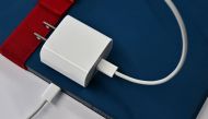 This photo illustration shows a USB-C cable in the port of an Apple iPad on September 11, 2023 in Los Angeles. (Photo by Frederic J Brown / AFP)