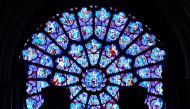 Picture of stained glass at Notre Dame used for representation. Wikimedia Commons / Zairon 