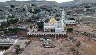 In this aerial view, a mosque stands amid the destruction caused by flash floods after the Mediterranean storm 
