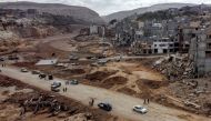 An aerial view shows Libya's eastern city of Derna on September 18, 2023, following deadly flash floods. (Photo by Mahmud TURKIA / AFP)
