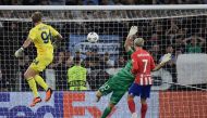 Lazio's Italian goalkeeper #94 Ivan Provedel (L) scores in the last minute during the UEFA Champions League 1st round group E football match between Lazio and Atletico Madrid at the Olympic stadium in Rome on September 19, 2023. (Photo by Filippo MONTEFORTE / AFP)