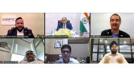 Ambassador of India to Qatar H E Vipul with other officials during the virtual business meet.