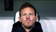 (FILES) Bayern Munich's German head coach Julian Nagelsmann looks on prior to the German first division Bundesliga football match between VfL Wolfsburg and FC Bayern Munich in Wolfsburg, Germany on February 5, 2023. (Photo by Ronny Hartmann / AFP) 