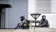 Police officers from the special intervention service take part in an operation at the Erasmus MC hospital that has been cordonned off following reports of a shooting, in Rotterdam, on September 28, 2023. (Photo by Sem van der Wal / ANP / AFP)