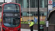 A Police forensic officer works inside a police cordon outside the Whitgift Centre on Wellesley Road in Croydon, south London, on September 28, 2023, following the fatal stabbing of a 15-year-old girl on her way to school on Wednesday. Photo by JUSTIN TALLIS / AFP