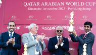 H E Sheikh Abdullah bin Khalifa Al Thani presented the Gr.1 (PA) Qatar Arabian World Cup winner's trophy to H E Sheikh Hamad bin Joaan Al Thani after Al Shaqab Racing's purebred Arabian colt Al Ghadeer won the race. QREC Chairman Issa bin Mohammed Al Mohannadi also present.
