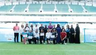 The participants of the FIFA Football for Schools Capacity Building Workshop pose for a photograph with officials.