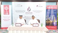 QIIB CEO, Dr Abdulbasit Ahmed Al Shaibei and Qatar Chamber General Manager and Chairperson of the Exhibition’s Technical Committee, Saleh bin Hamad Al Sharqi during the signing ceremony.