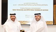 Acting Vice President for Academic Affairs at QU, Dr. Ibrahim Mohamed Al Kaabi, and Chairman of the Board of Directors at Apex Water and Services, Dr. Sheikh Faisal bin Jassem Al Thani during the signing ceremony.