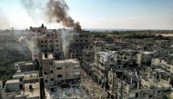 This picture taken on October 11, 2023, shows an aerial view of buildings destroyed by Israeli air strikes in the Jabalia camp for Palestinian refugees in Gaza City. (Photo by Yahya Hassouna / AFP)