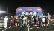 Participants pose after the conclusion of fourth round of Qatar National Sprint.