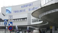 (Files) Soldiers patrol at Toulouse Blagnac Airport in Toulouse, on November 14, 2015. (Photo by REMY GABALDA / AFP)