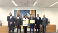 Permanent Representative of Qatar to UN and other International Organizations in Geneva H E Dr. Hend bint Abdalrahman Al Muftah and Director-General of the World Intellectual Property Organization Darren Tang along with other officials during the signing of MoU.