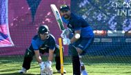 New Zealand's Tom Blundell (R) and Tom Latham during a practice session on the eve of the 2023 ICC Men's Cricket World Cup one-day international (ODI) match between India and New Zealand at the Himachal Pradesh Cricket Association Stadium in Dharamsala on October 21, 2023. (Photo by Money Sharma / AFP)