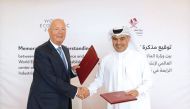 Minister of Finance, H E Ali bin Ahmed Al Kuwari with Executive Chairman of World Economic Forum, Professor Klaus Schwab at the agreement signing.