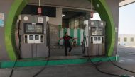 A Palestinian man gestures at a closed petrol station in the aftermath of Israeli strikes on the Rafah refugee camp in the southern Gaza Strip on October 25, 2023. (Photo by Said Khatib / AFP)