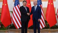 In this file photo the US President Joe Biden (R) and China's President Xi Jinping (L) meet on the sidelines of the G20 Summit in Nusa Dua on the Indonesian resort island of Bali on November 14, 2022. Photo by Saul Loeb / AFP