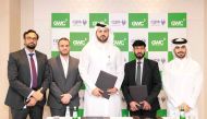 GWC Chief Operating Officer Rajeswar Govindan and QDB Executive Director of Advisory and Business Incubations Dr Hamad Mejegheer with other officials during the agreement signing.