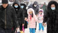 People pick up their children after school in snow in Harbin, northeast China's Heilongjiang Province, Nov. 8, 2023. Xinhua/Wang Jianwei