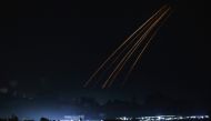 This picture taken from the Israeli side of the border with Gaza on November 10, 2023, shows Israeli flares over the Gaza Strip. (Photo by Kenzo Tribouillard / AFP)