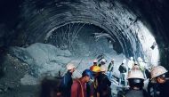 In this photograph taken on November 12, 2023, rescue workers gather at the site after a tunnel collapsed in the Uttarkashi district of India's Uttarakhand state. Photo by AFP