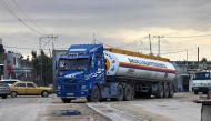 An Egyptian fuel truck waits on the Egyptian side of the Rafah border crossing with the southern Gaza Strip, in the northeastern Sinai province on November 15, 2023. (Photo by AFP)